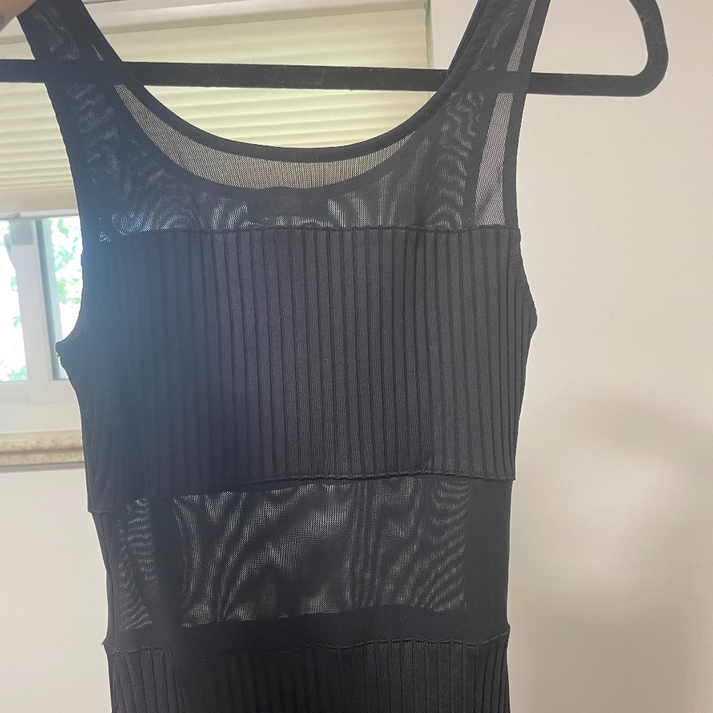 Bebe size XS mid-calf length dress with sheer cutouts